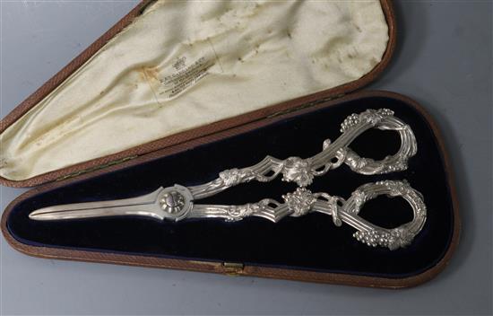A cased pair of Victorian cast silver grape shears by Francis Higgins II, 4.5 oz.